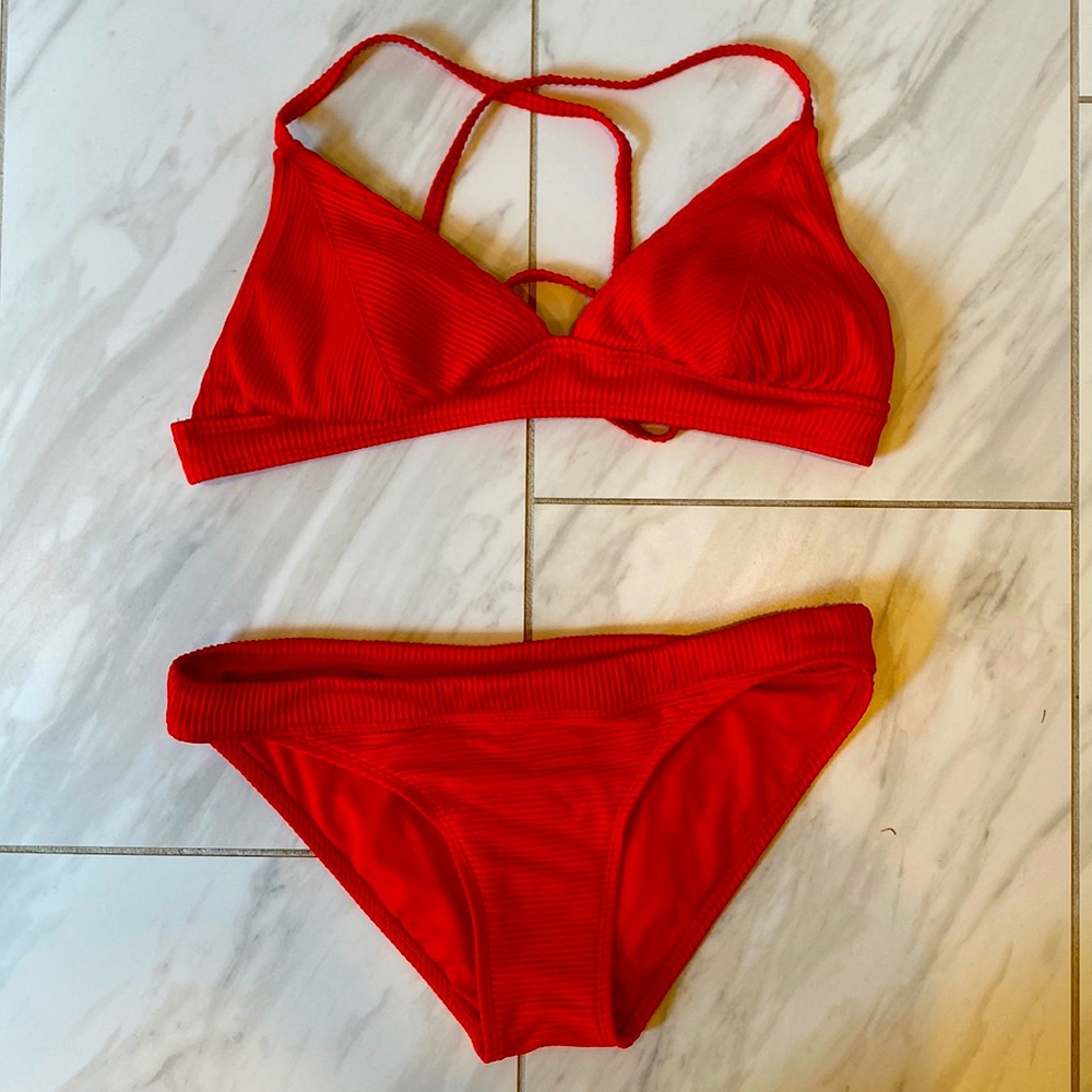 Xhileration bikini top size XL, bottoms size L, fit a medium